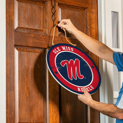 University of Mississippi Round Door Décor with Hanging Rope, 18x18 - Collegiate Home